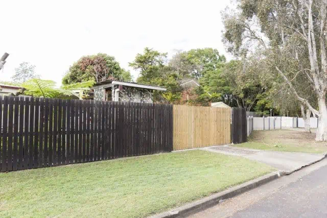 Old Fence new Sliding Auto Gate clad with Pine palings